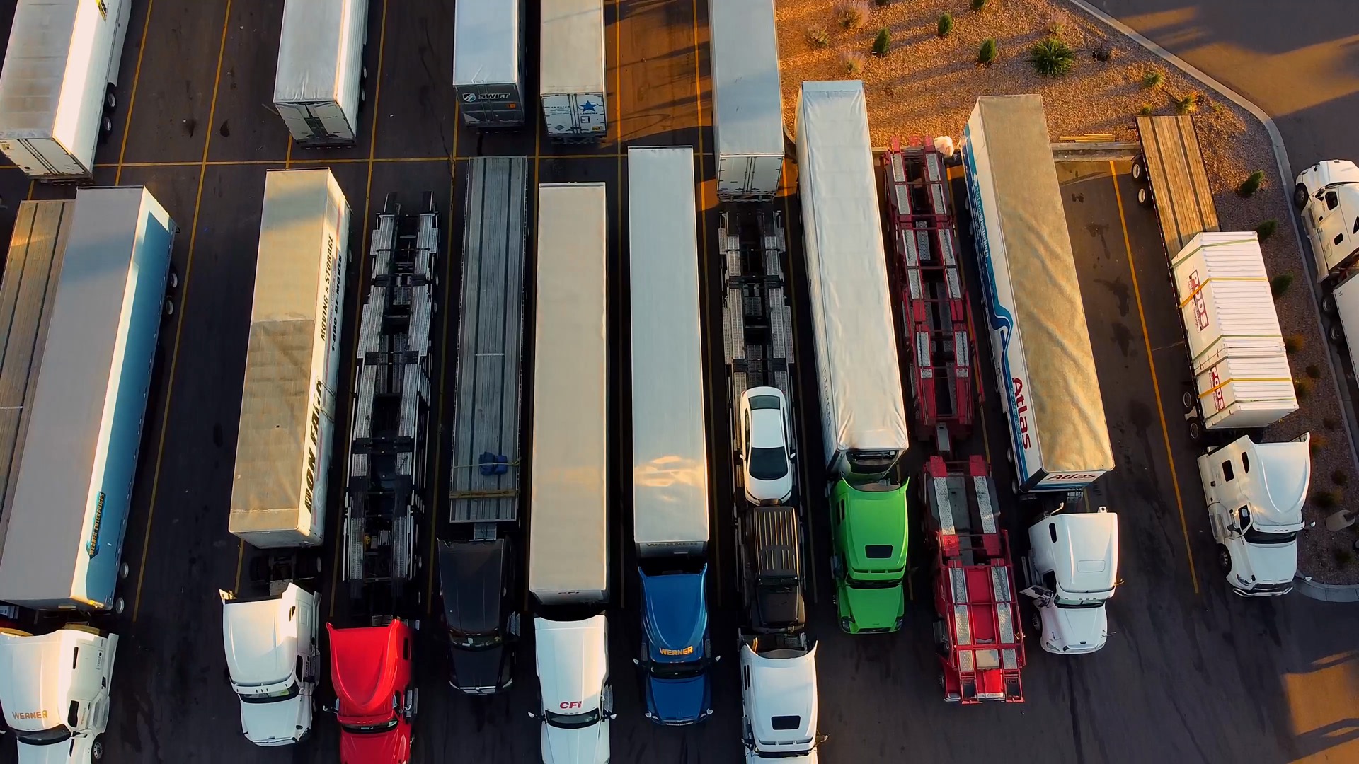 Jastan Logistics haulage trucks on a Kenyan highway at dawn